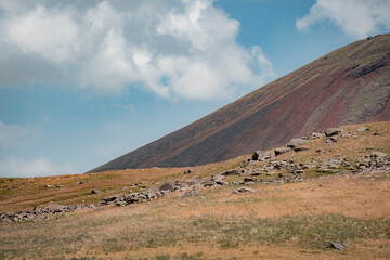 mountain landscape with blue sky and clouds