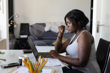 focused woman plus size works on computer, problem