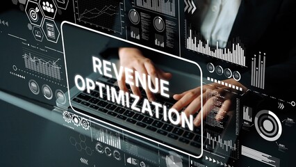 Hands Typing on Laptop with Revenue Optimization Graphics and Data Visualization Overlays in a Modern Business Setting. Asymptotic smart data analytic.
