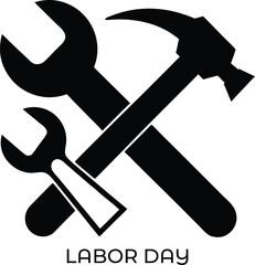 Hammer and wrenches crossed together as a symbol of labor and craftsmanship silhouette isolated on white background
