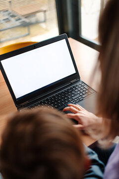 mother and child using computer