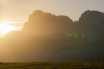 Scenic sunset over the mountains in Dolomites in autumn