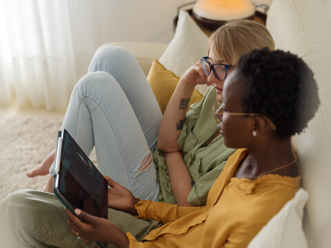 Young women watching TV series online