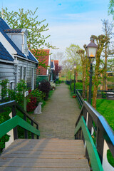 rural dutch country street of small old town Zaanse Schans, Netherlands