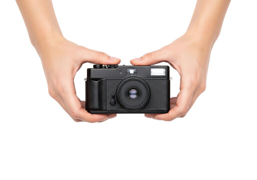 Photo of close up of a vintage camera held in two hands against a clean transparent background in studio