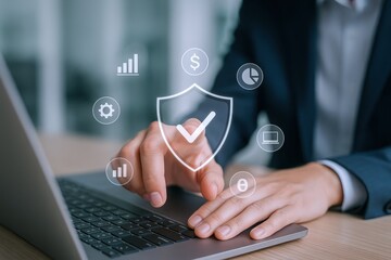 Cybersecurity Professional Securing Data with Advanced Protection Technology and Digital Shield Visualization on Laptop Screen