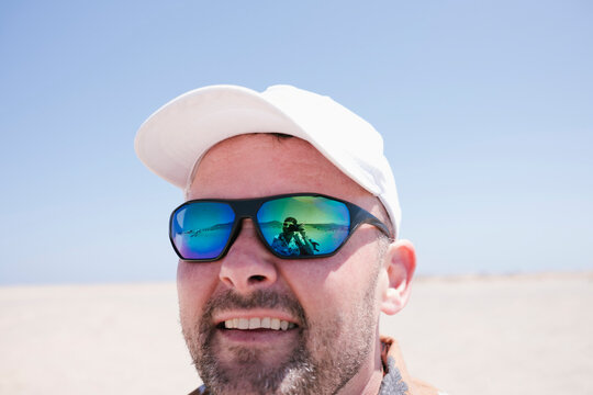 Portrait with Photographer Reflection in Sunglasses