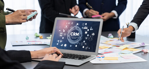 Analyst team use sticky note for creative and analytic brainstorm for business idea with BI data dashboard on laptop screen. Analysis financial data visualization tech for marketing strategy. Prodigy