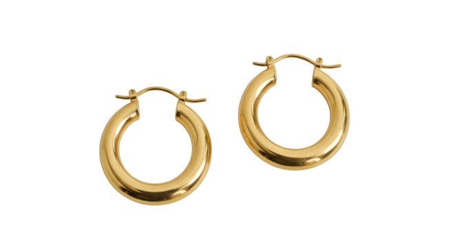 Gold hoops shine against a black background. Perfect for product shots, jewelry e-commerce, or branding.