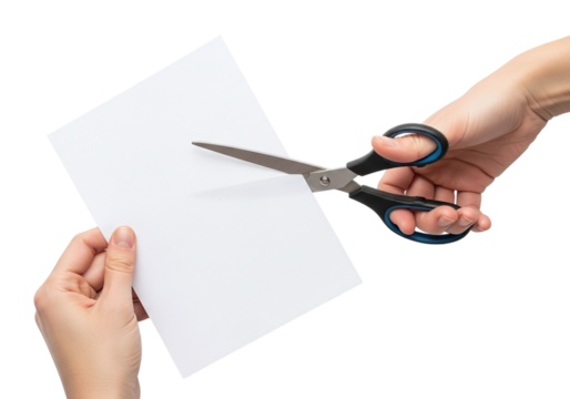 Photo of close up of hands cutting a white piece of paper with zig zag scissors creating a decorative edge isolated on transparent background