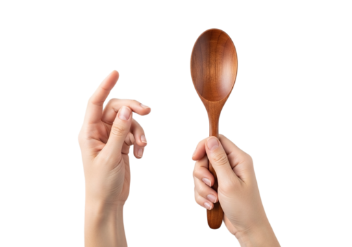 Photo of close up of a hand holding a wooden spoon on a transparent background perfect for cooking and food related content