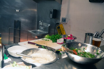 chef prepares food on counter