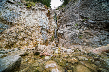 Mountain rock with a stunning waterfall at the area of Herzogstand