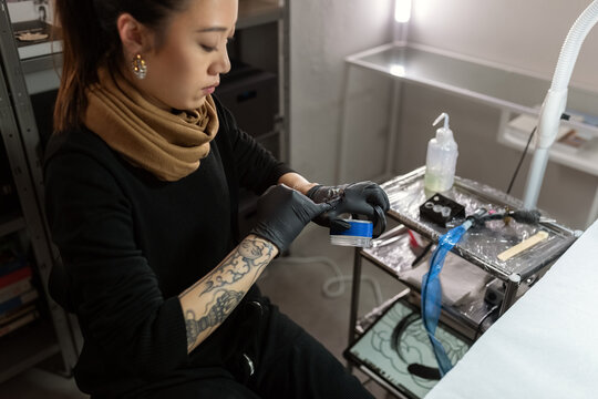 Tattoo Artist preparing for work