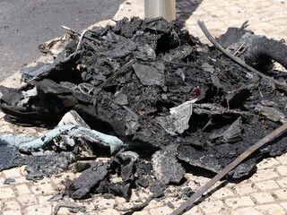 charred remains or belongings from an apartment fire