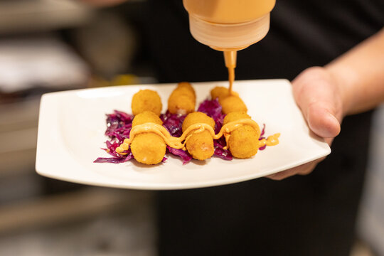 a freshly prepared croquette appetizer