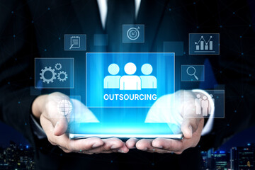 Outsourcing concept showing collaboration, delegation, global workforce, productivity, and task management through remote teams and external service providers Vouch