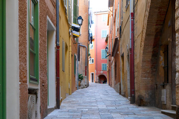 view of cosy street in old town of villefranche, Nice, France