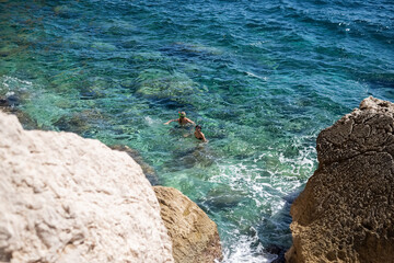 Couple swimming in the sea