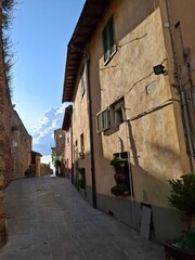 street in the old town of montalcino, tuscany