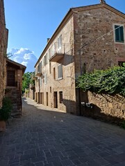street in the old town of montalcino, tuscany