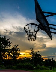 Basketball hoop silhouette sunset