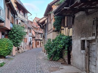 narrow street in the old town of Eguisheim, Alsace, France