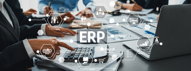 A professional business meeting showcasing a focus on ERP solutions, highlighting technology-driven...