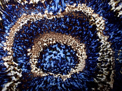 Textured background of microscopic glaze of Chinese ceramics tea cup
