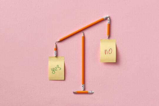 Pencils and sticky notes forming choice scales