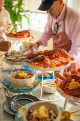 waiter serving seafood