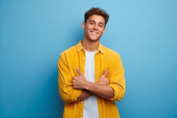 Happy Caucasian Man in Yellow Shirt Studio Shot