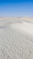 White Sands dunes under clear blue sky