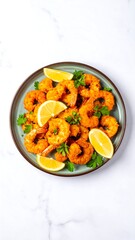Crispy fried shrimp with lemon and herbs