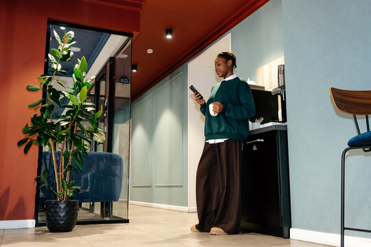 Coffee break in shared office kitchen