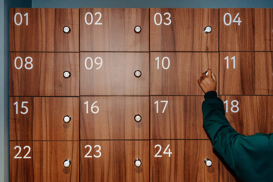 Numbered wooden locker wall with digital locks
