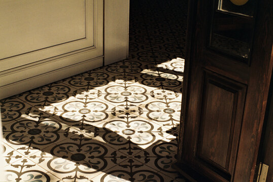 Intricate Floor Tiles and Light Shadows
