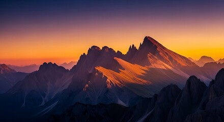 Obraz premium Scenic mountain range at sunset with colorful sky and dramatic light