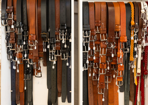 Display of Leather Belts in Market Stall