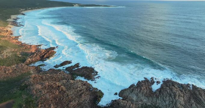 4k Aerial views of rugged rocky coastline in South West Australia at sunset