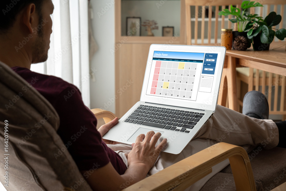 Wall mural calendar on computer software application for modish schedule planning for personal organizer and on