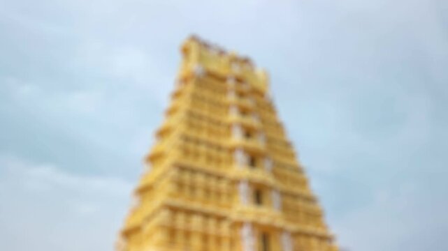 Bokeh view of Sri Chamundeshwari Temple, located on Chamundi Hills near Mysore, India. Blurred background footage.
