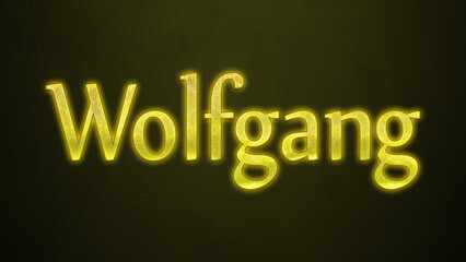 Neon glowing yellow Deutsche name of Wolfgang on dark background.
