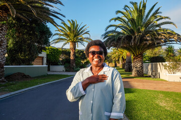 Casual Portrait of Woman with Palms in Background
