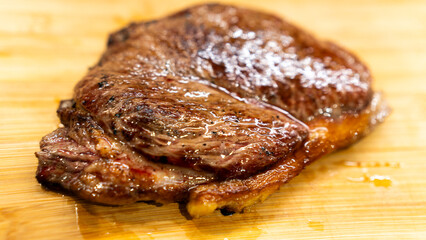 Juicy rare beef steak with perfect sear and appetizing pink center. Succulent meat showcase for gourmet photography, butchers, and premium restaurant marketing