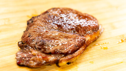 Juicy rare beef steak with perfect sear and appetizing pink center. Succulent meat showcase for gourmet photography, butchers, and premium restaurant marketing