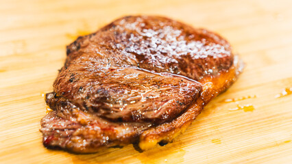 Juicy rare beef steak with perfect sear and appetizing pink center. Succulent meat showcase for gourmet photography, butchers, and premium restaurant marketing