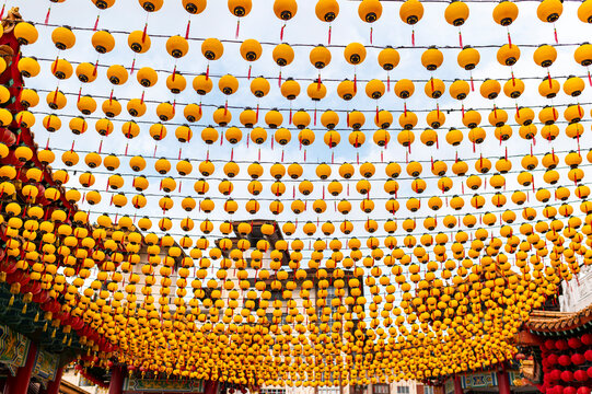 Yellow lanterns at temple courtyard
