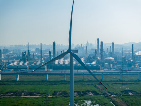 Aerial View of Wind Turbines and Chemical Industry