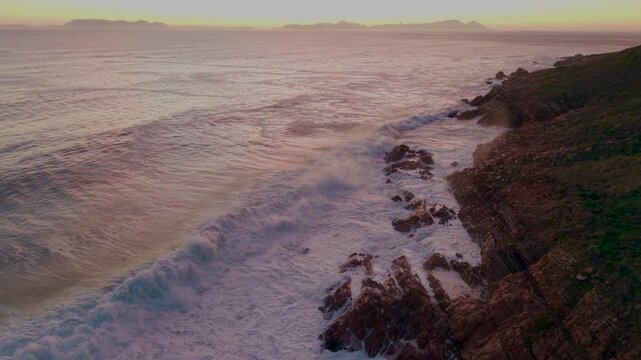Ocean landscape with waves and dramatic evening light